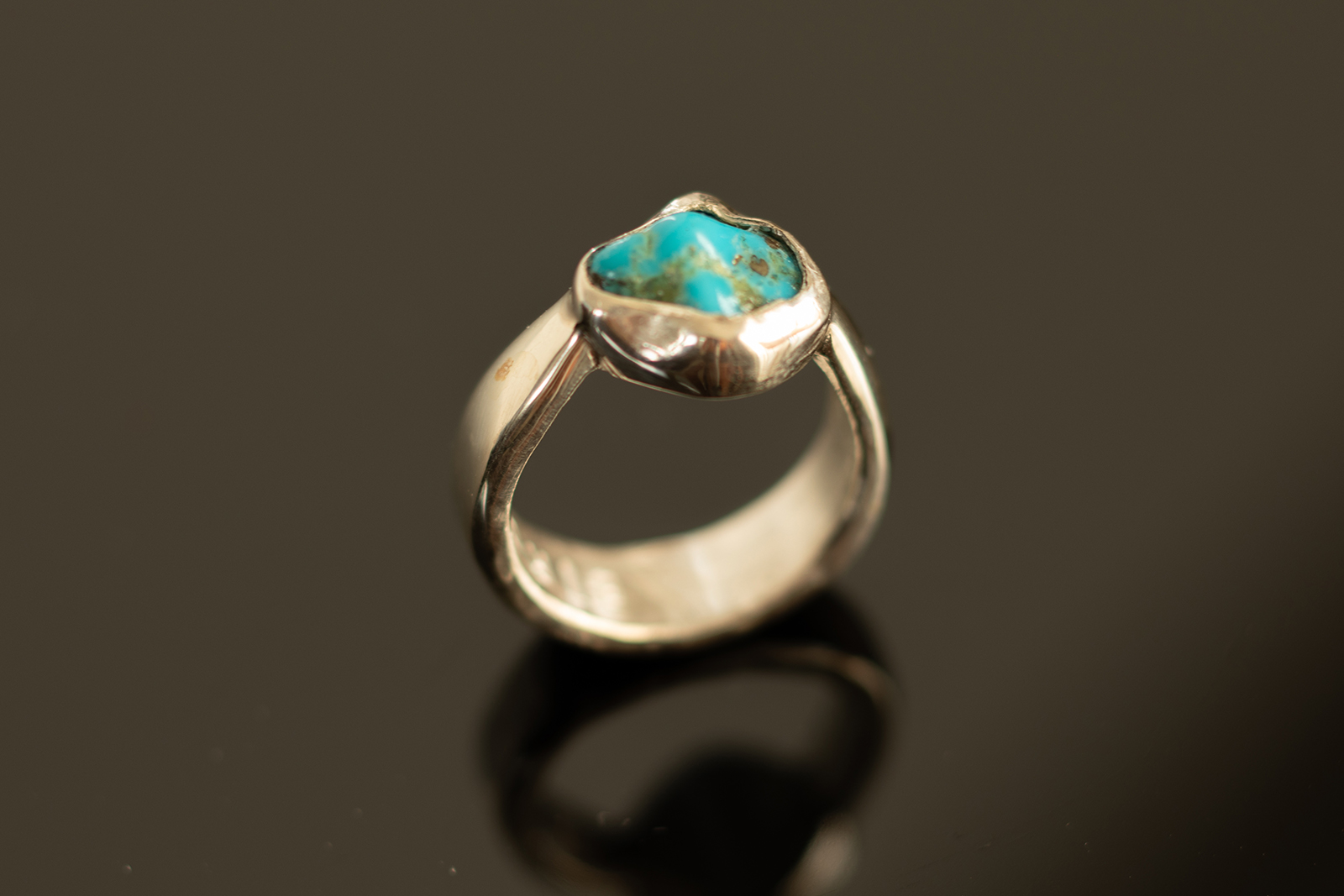 ring on black table top