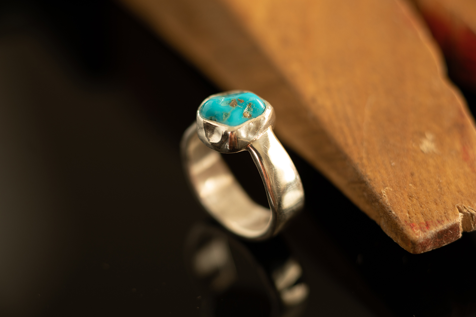 ring with jeweler's wooden peg